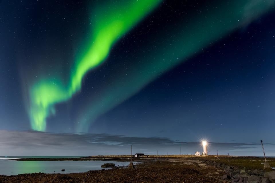 The Northern Lights over the Grotta Lighthouse (Getty Images/iStockphoto)