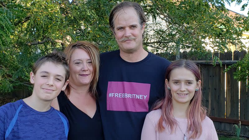 The Simis family, Atticus, Sarah, Arthur and Ophelia, pose for a photo in Gardnerville