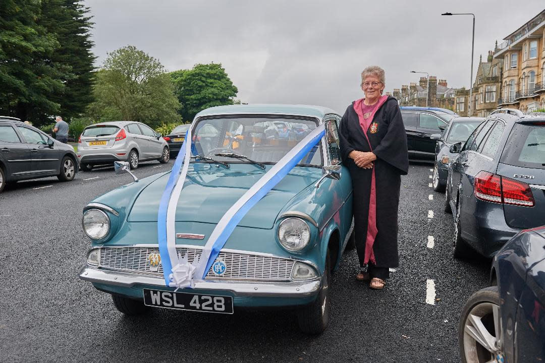 They hired exactly the same car as the famous Harry Potter one – the Ford Anglia 105E that was enchanted by Arthur Weasley to fly and become invisible – and the driver wore a Harry Potter Gryffindor robe. (Supplied)