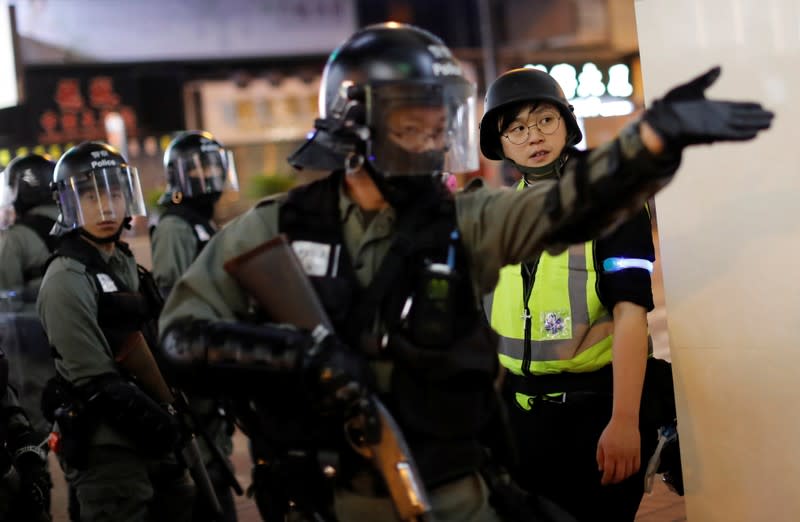 The Wider Image: Sermons with saline: Hong Kong pastor offers aid and prayers