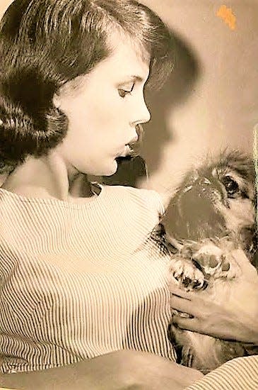 Augusta's Vivian Davis with her dog Tico.