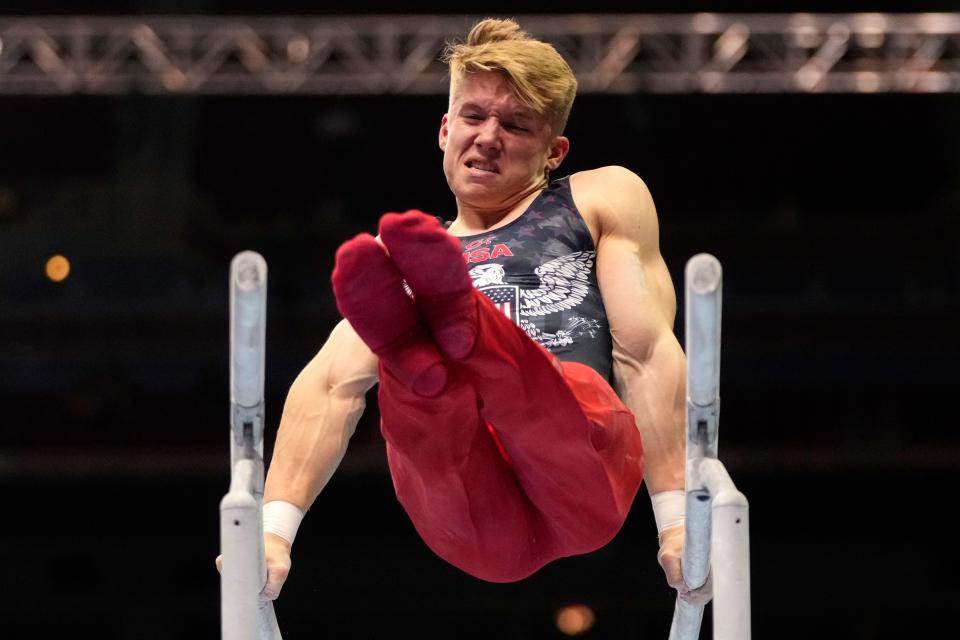 Shane Wiskus competes on the parallel bars Saturday during the men's U.S. Olympic gymnastics trials.