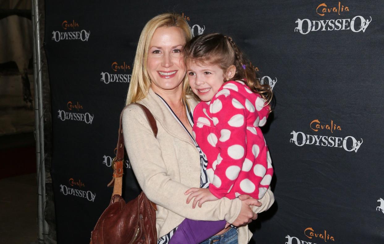 Angela Kinsey and her daughter attend an event in 2013 in California.&nbsp; (Photo: Paul Archuleta via Getty Images)