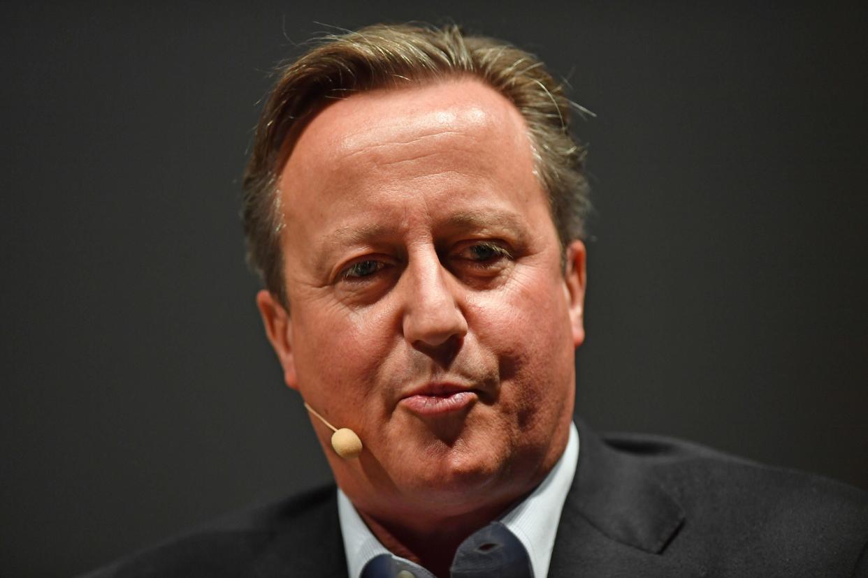 David Cameron speaking during the Cheltenham Literature Festival at Cheltenham Racecourse in 2019 (PA)