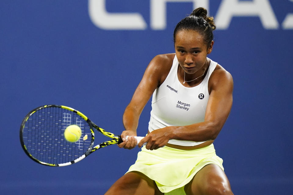 Leylah Fernandez, of Canada, returns a shot to Oceane Dodin, of France, during the first round of the US Open tennis championships, Monday, Aug. 29, 2022, in New York. (AP Photo/Frank Franklin II)