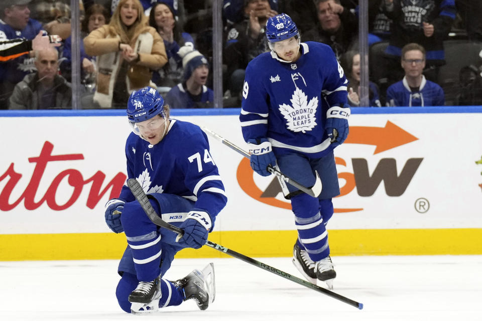 Toronto Maple Leafs' Bobby McMann, left, celebrates scoring against the Anaheim Ducks as Nicholas Robertson looks on during the first period of an NHL hockey game, Saturday, Feb. 17, 2024 in Toronto. (Chris Young/The Canadian Press via AP)