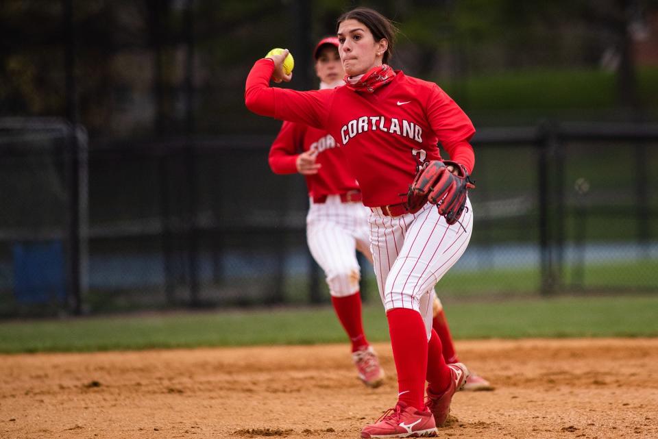 SUNY Cortland's Tory Reich throws to first base during the softball game at SUNY New Paltz on April 17, 2021. Reich, a Cornwall graduate, was named the SUNY Athletic Conference rookie of the year. KELLY MARSH/For the Times Herald-Record