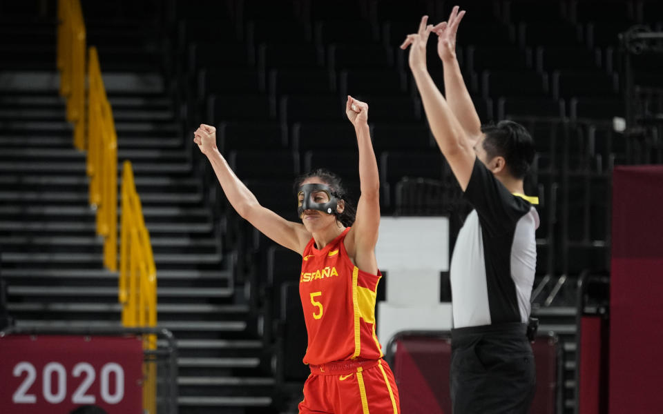 Spain's Cristina Ouvina (5) celebrates during women's basketball preliminary round game against Canada at the 2020 Summer Olympics, Sunday, Aug. 1, 2021, in Saitama, Japan. (AP Photo/Eric Gay)