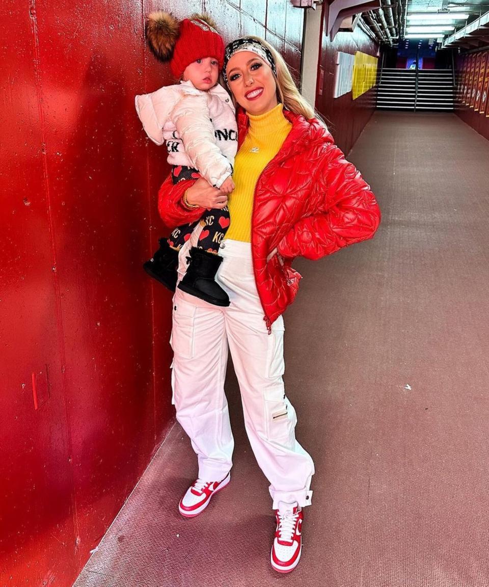 Pregnant Brittany Mahomes and Sterling Bundle Up to Share a Hug on the Sidelines with Patrick