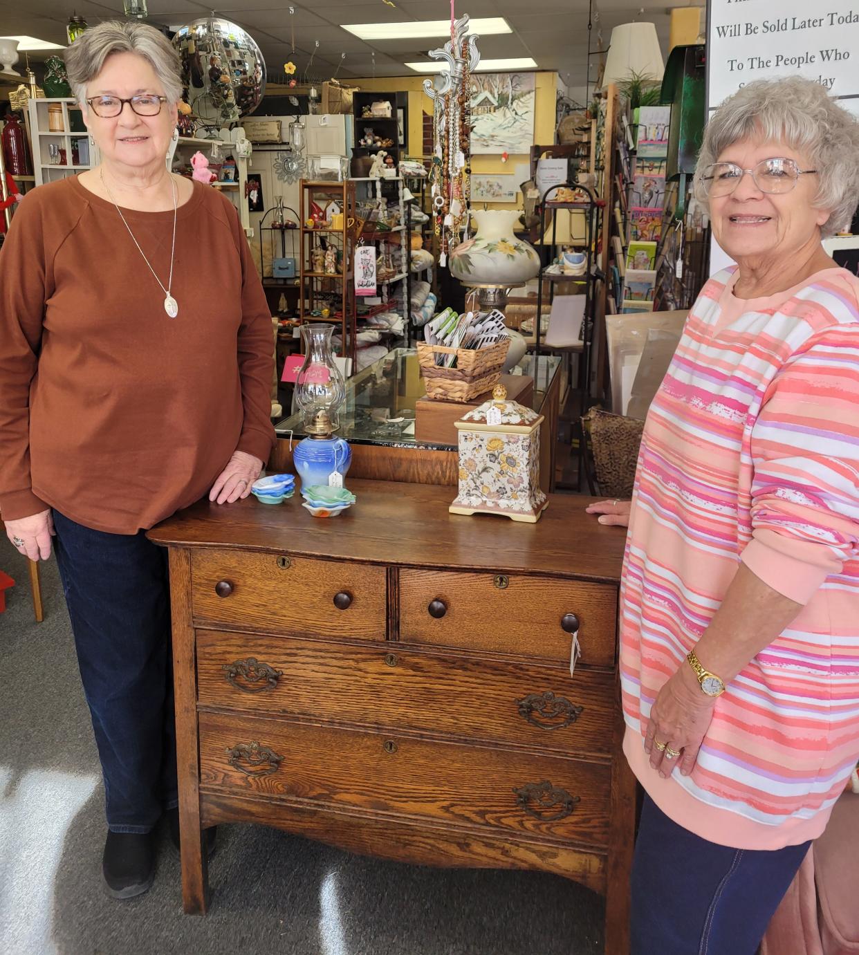 Liz Donaldson (left) and Charlotte Jellicorse have decided to close The Cottage Door Antiques & Gifts after 14 years.