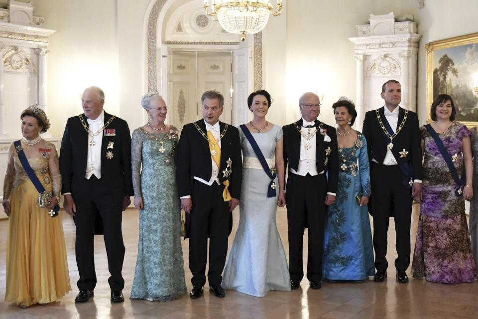 FILE - From left, Queen Sonja of Norway, King Harald V of Norway, Queen Margrethe of Denmark, President of Finland Sauli Niinist', his wife Jenni Haukio, King Carl XVI Gustaf of Sweden, Queen Silvia of Sweden, President of Iceland Gudni Thorlacius Johannesson and his wife Eliza Jean Reid pose before the dinner held at the Presidential Castle during the visit of the Nordic heads of state in Helsinki, Thursday, June 1, 2017. Sweden this week marks the 50th anniversary of King Carl XVI Gustaf’s accession to the throne. Margrethe and King Harald V of Norway are among the dignitaries on the guest list for the events in Stockholm. (Antti Aimo-Koivisto/Lehtikuva via AP, File)