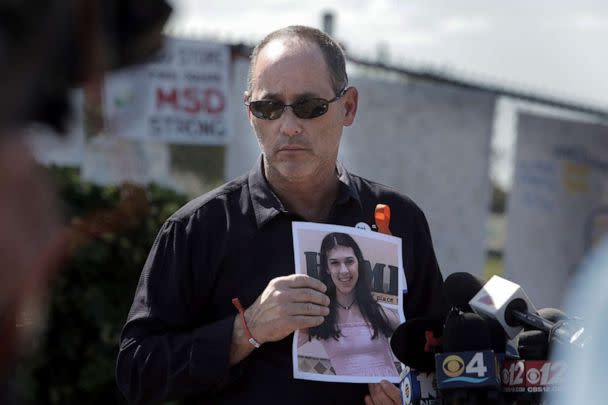 PHOTO: Fred Guttenberg holds a picture of his slain daughter, Jaime, as he listens to questions from the media in front Stoneman Douglas high school on March 5, 2018 in Parkland, Fla. (Tribune News Service via Getty Images, FILE)