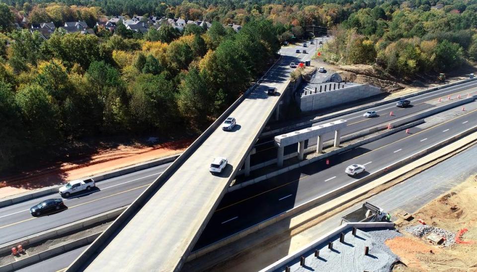 The I-485 Express Lanes project includes replacing the current two-lane Ballantyne Commons Parkway bridge with a new four-lane bridge.