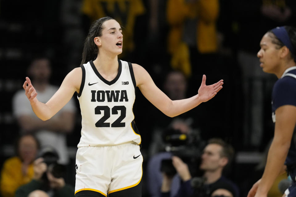 Iowa guard Caitlin Clark (22) reacts during the first half of an NCAA college basketball game against Penn State, Thursday, Feb. 8, 2024, in Iowa City, Iowa. (AP Photo/Charlie Neibergall)