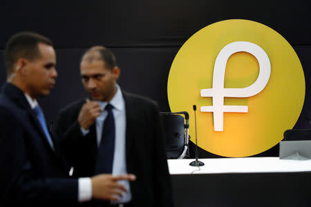 The new Venezuelan cryptocurrency "Petro" logo is seen during its launching in Caracas, Venezuela February 20, 2018. REUTERS/Marco Bello