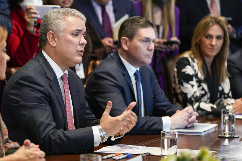 Colombian President Ivan Duque Marquez speaks during his meeting with President Joe Biden in the Cabinet Room of the White House, Thursday, March 10, 2022, in Washington. (AP Photo/Patrick Semansky)