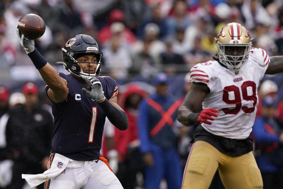 Chicago Bears' Justin Fields throws during the first half of an NFL football game against the San Francisco 49ers Sunday, Sept. 11, 2022, in Chicago. (AP Photo/Nam Y. Huh)