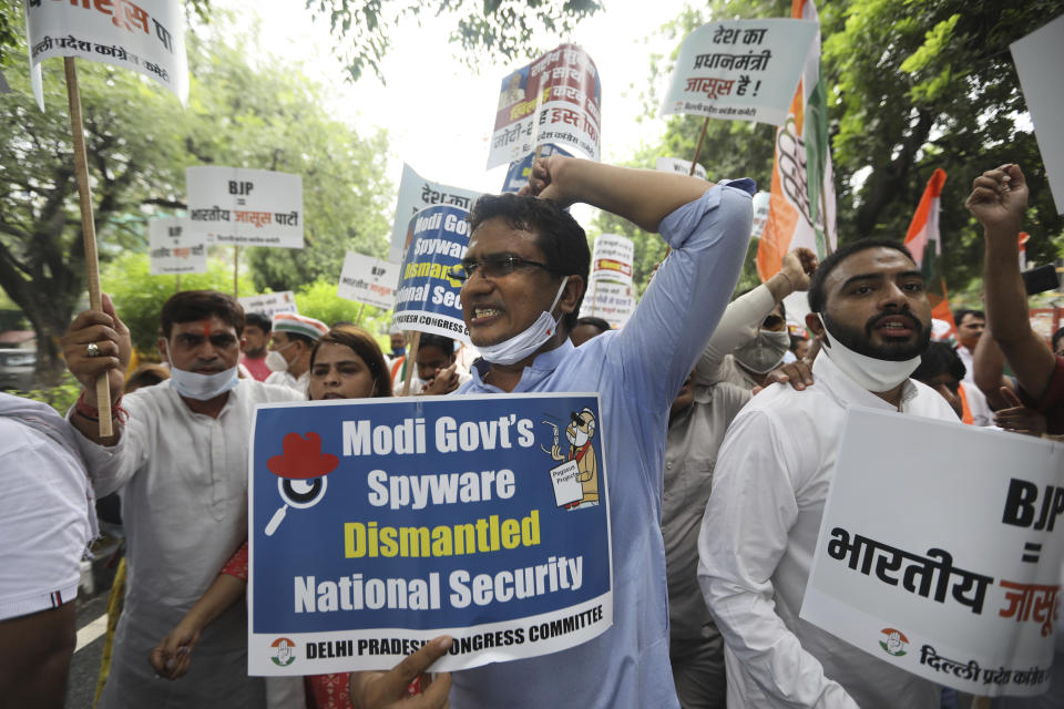 Congress party workers shout slogans during a protest accusing Prime Minister Narendra Modi’s government of using military-grade spyware to monitor political opponents, journalists and activists in New Delhi, India, Tuesday, July 20, 2021. The protests came after an investigation by a global media consortium was published on Sunday. Based on leaked targeting data, the findings provided evidence that the spyware from Israel-based NSO Group, the world’s most infamous hacker-for-hire company, was used to allegedly infiltrate devices belonging to a range of targets, including journalists, activists and political opponents in 50 countries. (AP Photo/Manish Swarup)