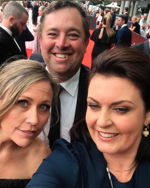 Better Homes & Gardens landscaper Jason Hodges poses for a photo with Karen Martini and Tara Dennis