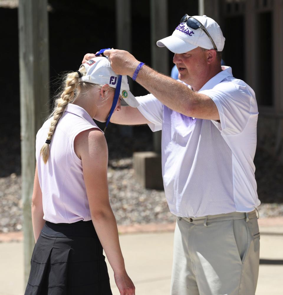 Albany junior Abby Thelen receives her championship medal in the Section 6-2A final round Monday, June 7, 2021, at Blackberry Ridge Golf Course in Sartell. 