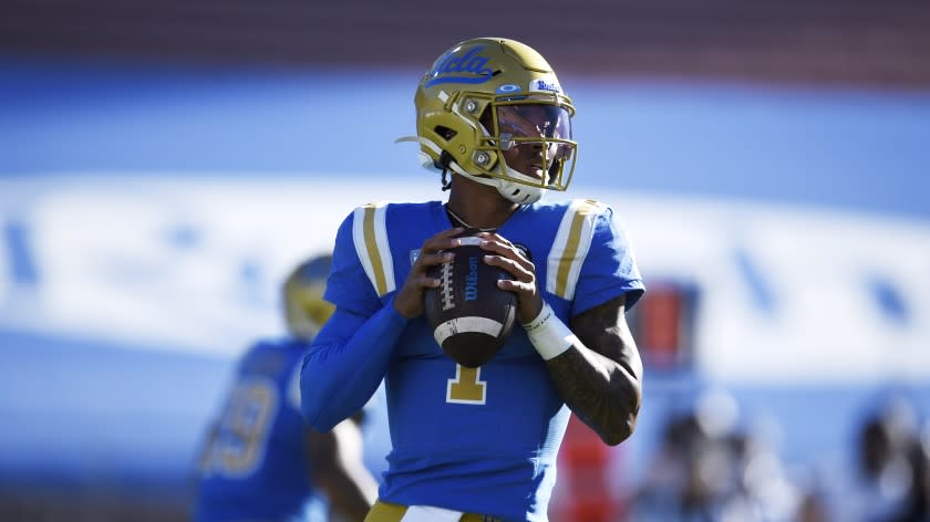 UCLA quarterback Dorian Thompson-Robinson looks to pass during the first half of an NCAA college football game against California in Los Angeles, Sunday, Nov. 15, 2020. (AP Photo/Kelvin Kuo)