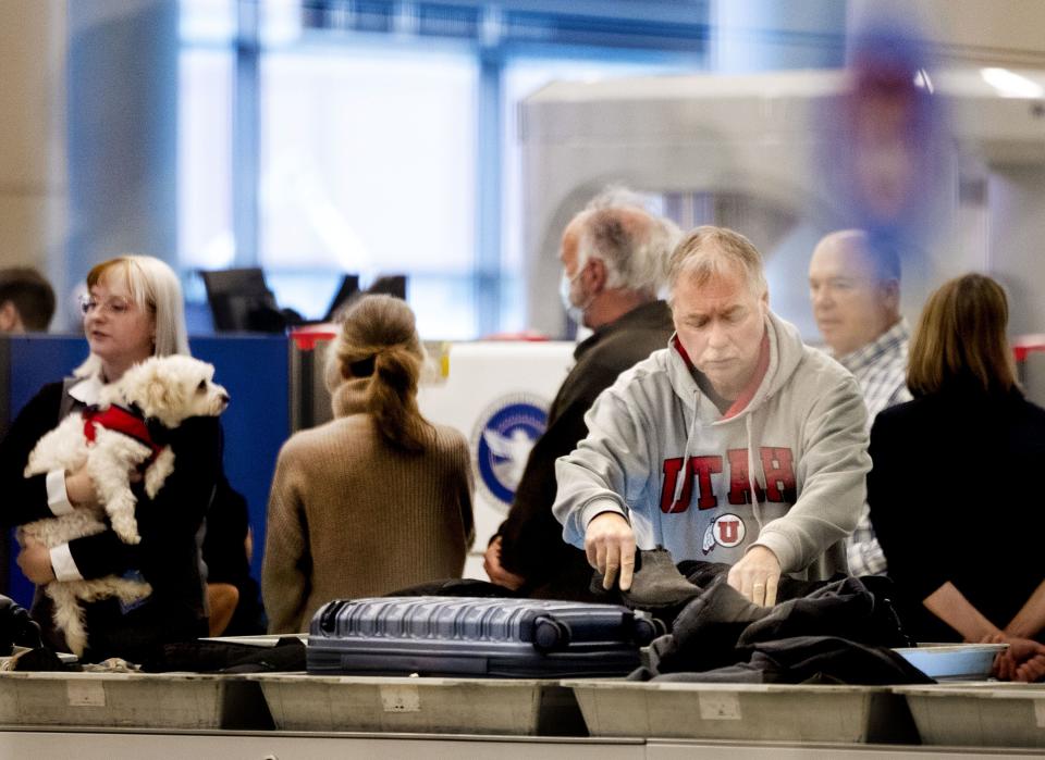 Travelers go through security at Salt Lake City International Airport on Monday, Dec. 18, 2023. | Laura Seitz, Deseret News