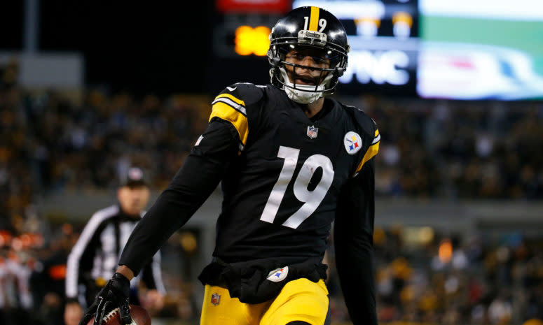 A closeup of JuJu Smith-Schuster celebrating a touchdown catch.