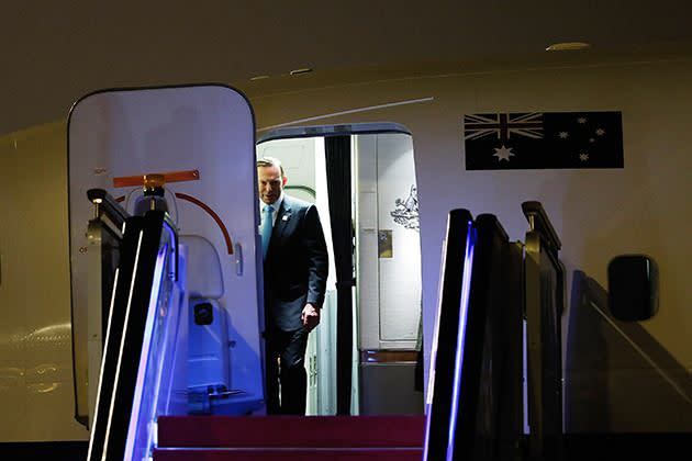 Prime Minister Abbott arrives at Beijing Capital International Airport. Photo: Getty