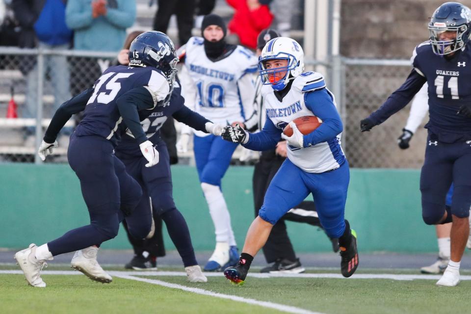 Middletown runs against Moses Brown in Saturday's Division III Super Bowl.