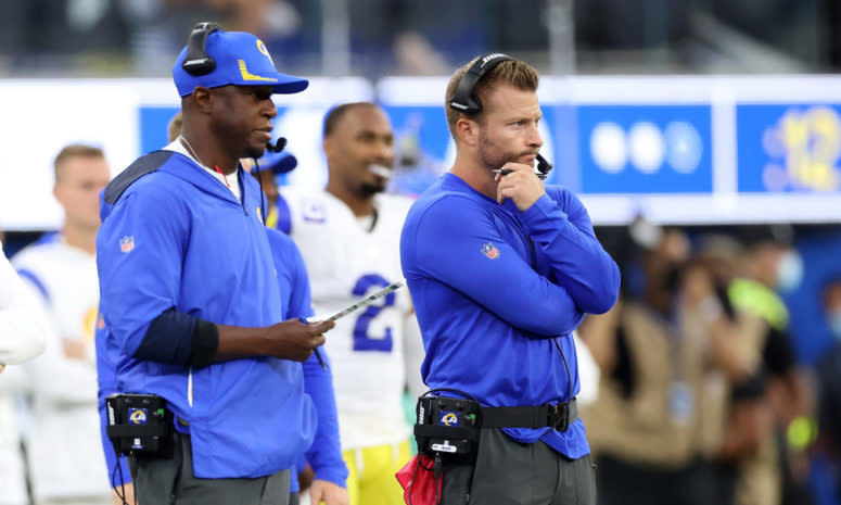 Rams head coach Sean McVay and defensive coordinator Raheem Morris stand side-by-side on the sidelines.