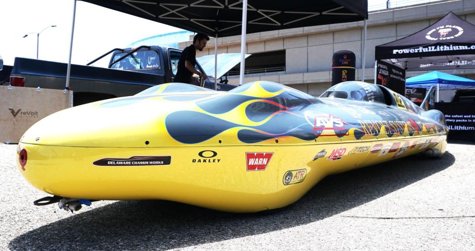 a yellow and black race car