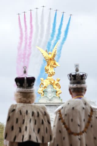 Handout/Chris Jackson/Getty for Buckingham Palace Queen Camilla and King Charles watch the flypast following the coronation on May 6