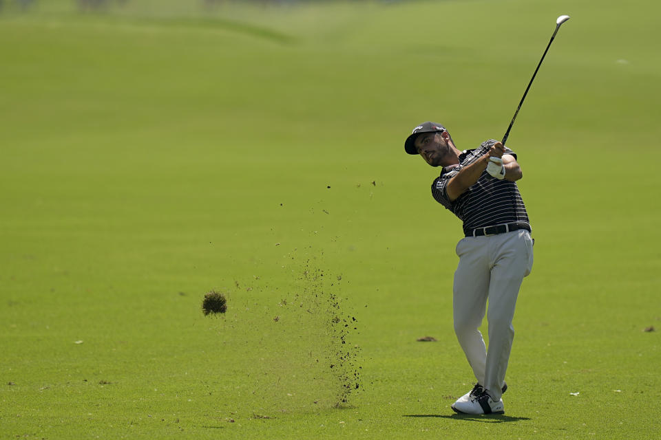 Abraham Ancer, of Mexico, hits from the fairway on the 13th hole during the first round of the PGA Championship golf tournament, Thursday, May 19, 2022, in Tulsa, Okla. (AP Photo/Eric Gay)