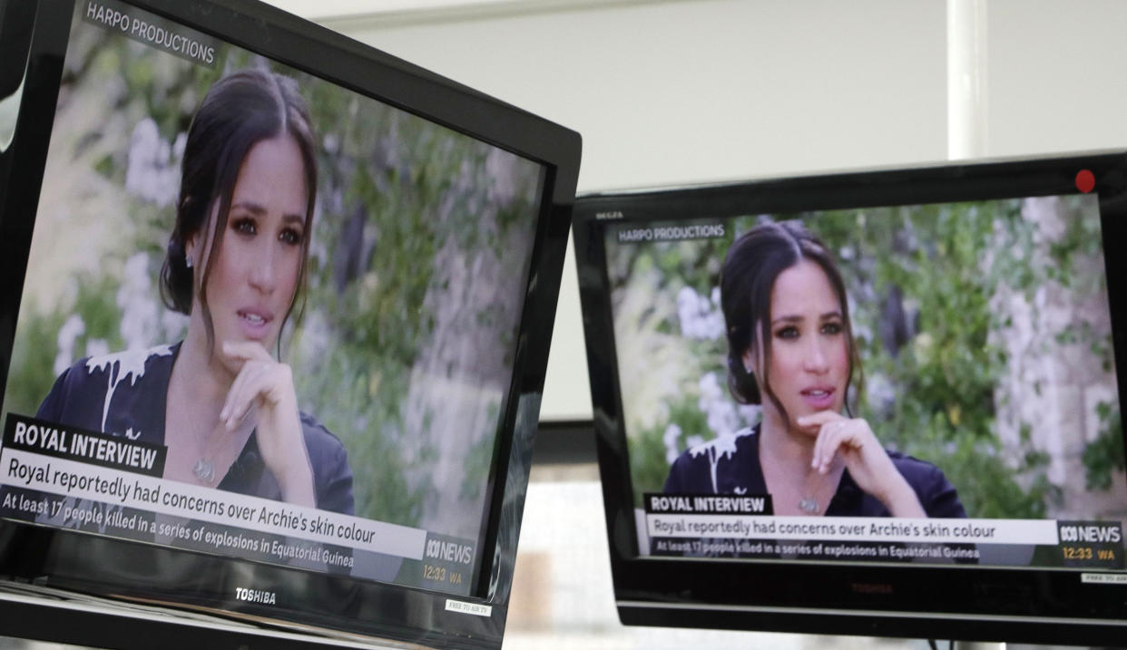 Australian television news in Sydney on March 8, 2021, reports on an interview of The Duke and Duchess of Sussex by Oprah Winfrey. (Photo: Rick Rycroft/AP)