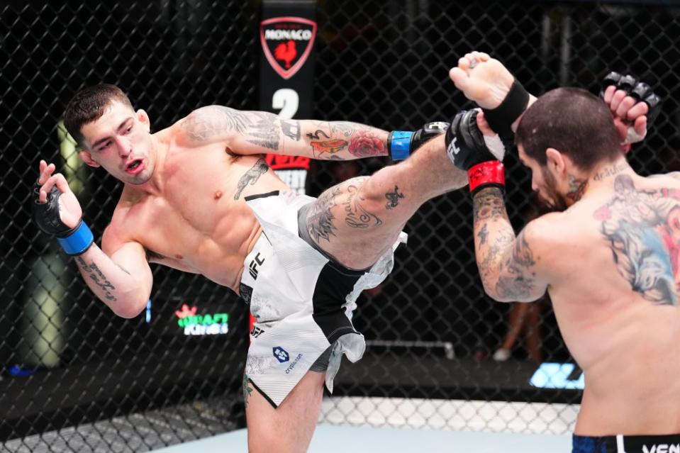 LAS VEGAS, NEVADA – JANUARY 13: (L-R) Preston Parsons kicks Matthew Semelsberger in a welterweight fight during the UFC Fight Night event at UFC APEX on January 13, 2024 in Las Vegas, Nevada. (Photo by Chris Unger/Zuffa LLC via Getty Images)