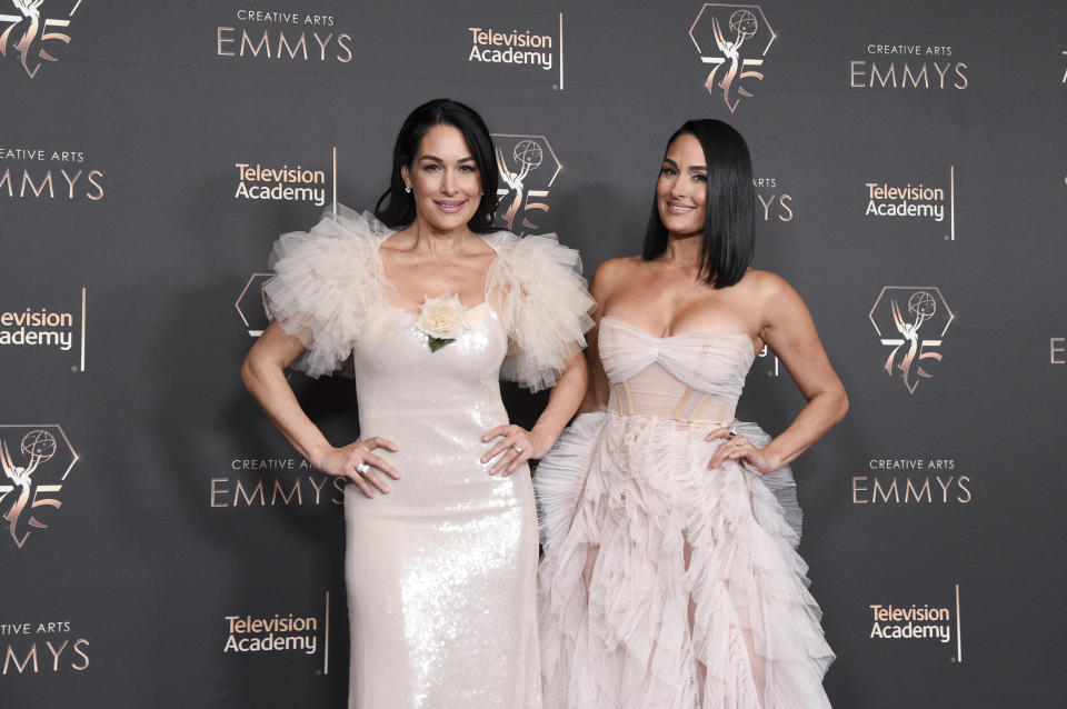 Brie Garcia, left, and Nikki Garcia pose in the press room during night two of the Creative Arts Emmy Awards on Sunday Jan. 7, 2024, at the Peacock Theater in Los Angeles. (Photo by Richard Shotwell/Invision/AP)