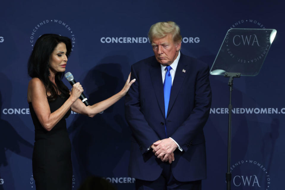 CEO and President of Concerned Women for America (CWA) Penny Nance says a prayer for former U.S. President Donald Trump after he addressed the Concerned Women for America Legislative Action Committee (CWALAC) on Sept. 15, 2023, in Washington, D.C. <span class="copyright">Alex Wong/Getty Images</span>