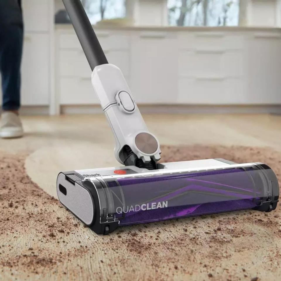 Shark Detect Pro vacuuming up dirt