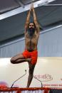 <p>Yoga guru Baba Ramdev performs Yoga during International Yoga Day celebrations in Ahmadabad, India, Wednesday, June 21, 2017. (Photo: Ajit Solanki/AP) </p>