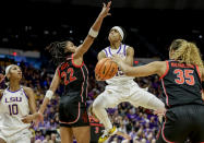 LSU guard Alexis Morris (45) drives between Georgia forwards Malury Bates (22) and Javyn Nicholson (35) in the first half of an NCAA college basketball game in Baton Rouge, La., Thursday, Feb. 2, 2023. (AP Photo/Derick Hingle)