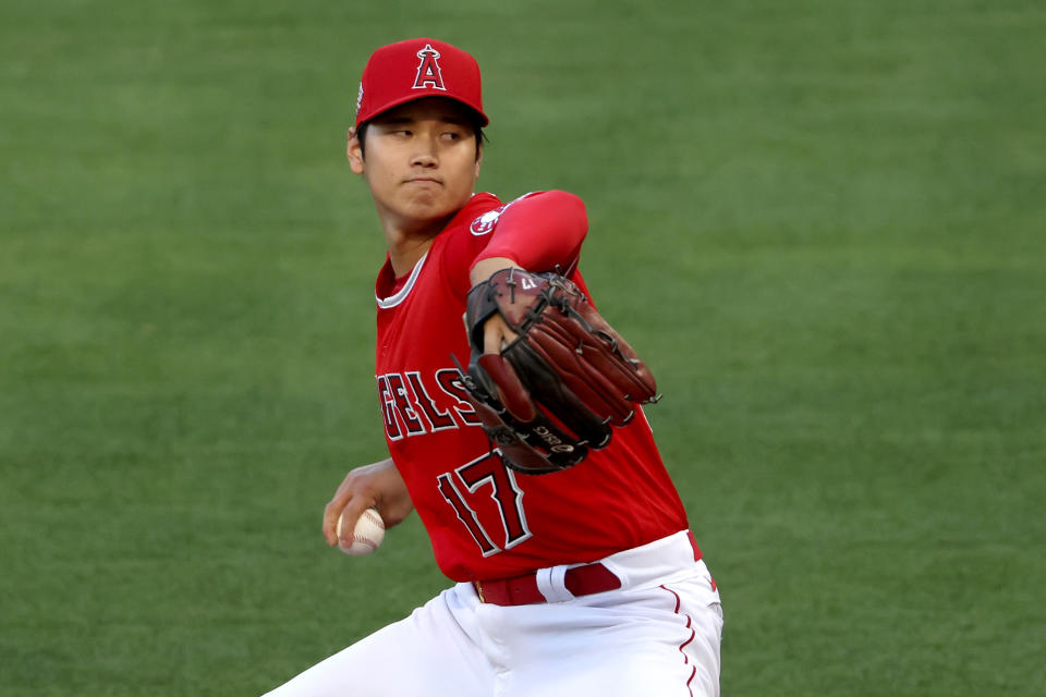 ANAHEIM, CALIFORNIA - APRIL 20: Shohei Ohtani #17 of the Los Angeles Angels pitches during the first inning of a game against the Texas Rangers at Angel Stadium of Anaheim on April 20, 2021 in Anaheim, California. (Photo by Sean M. Haffey/Getty Images)