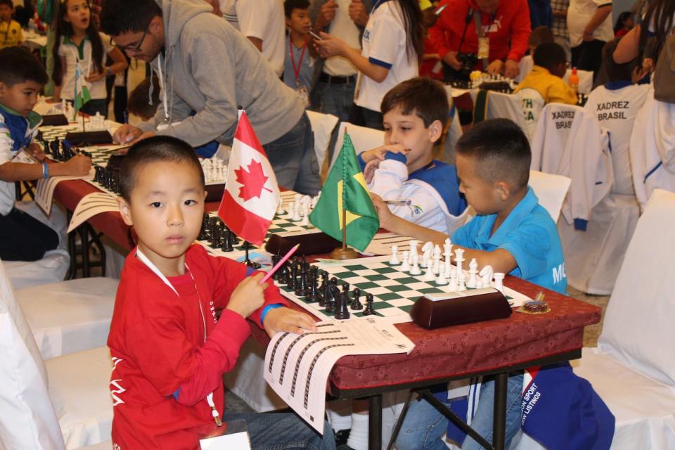 Johnathan Han has been playing chess since age 5 (he's pictured here competing in Brazil at age 8). According to Chess Federation of Canada youth coordinator Christina Tao, whose daughter played Han years ago, he was a natural from the beginning. "Some kids don't even have to learn it," she recalled.