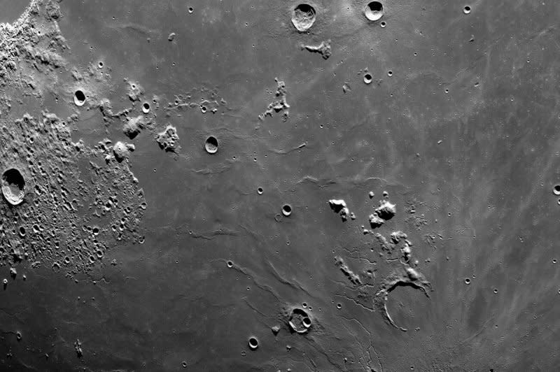 Cameras mounted on the crew module of the Orion spacecraft captured these views of the moon's surface on Dec. 5. NASA's Artemis II mission will orbit the moon before returning to Earth. Image courtesy of NASA/UPI
