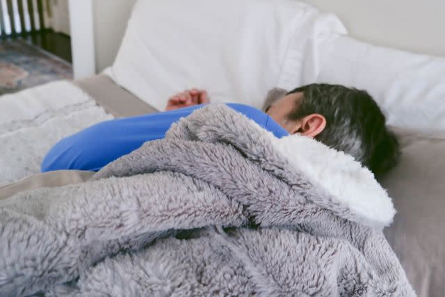 <p>Getty</p> Stock image of a man sleeping.