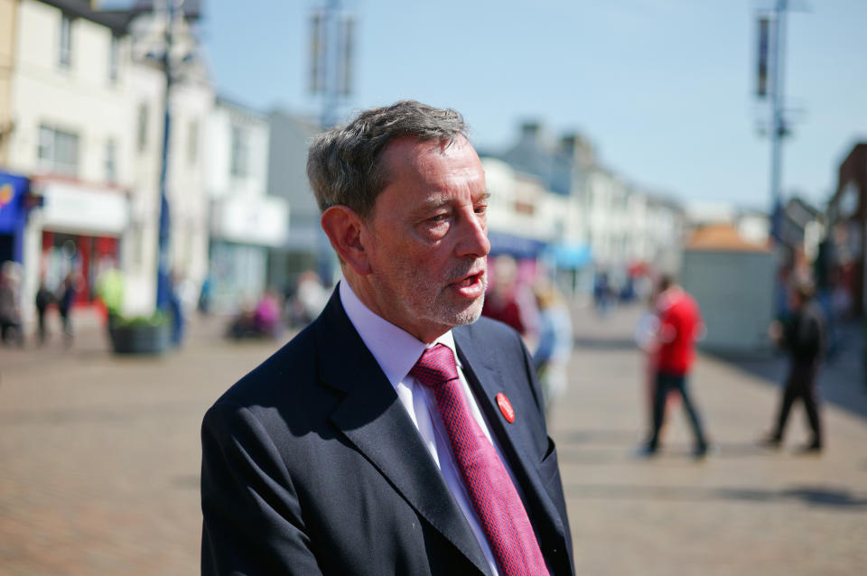 REDCAR, ENGLAND - APRIL 22:  David Blunkett, veteran Labour politician and former Home Secretary, Education Secretary and Work and Pensions Secretary in the previous Labour government stands in the high street during a campaigning visit on April 22, 2015 in Redcar, England. The visit to this key marginal seat comes ahead of what is predicted to be the closest fought General Election which takes place on May 7.  (Photo by Ian Forsyth/Getty Images)