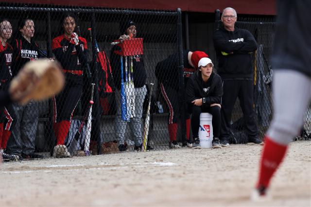 Richmond head coach Alexis Cox watches her team in the field during a scrimmage against Adams Central March 21, 2023.