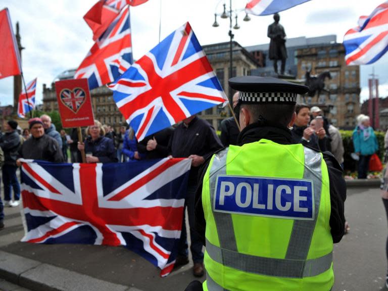 An unprecedented number of extra police have been deployed in parts of the UK in anticipation of violence as voters go to the polls for the European elections.The plan, revealed by Police Scotland, follows an increasingly tense and hostile election campaign that has seen clashes between far-right activists and anti-racism protesters.Deputy Chief Constable Will Kerr, of Police Scotland, said four units comprising about 100 public order officers would be "strategically placed" throughout the day.He said: "We would never normally need that sort of support, particularly for European elections."We do now. The tone is just fundamentally different."Police in London said they would be revealing any extra measures in an announcement later on Thursday.In a sign of how seriously police are treating threats of violence linked to the EU election, Sadiq Khan was given round-the-clock protection after receiving a deluge of death threats in the lead-up to polling day.The London mayor said his Muslim faith had made him a target in the wake of the 2016 referendum.At the weekend, officers warned there would be arrests after two police vehicles were damaged during a disturbance at a Tommy Robinson campaign event.Footage posted on social media showed clashes between supporters of the campaigner, whose real name is Stephen Yaxley-Lennon, and counter-demonstrators in Oldham, Greater Manchester.On Tuesday, Nigel Farage became the latest European Parliament candidate to have milkshake thrown at him, in a growing protest tactic aimed at right-wing activists.A day later, the Brexit Party leader was said to have refused to leave his campaign bus after three men armed with milkshakes were spotted in the crowd.Policing plans for previous elections have tended to focus on preventing voter intimidation and fraud.During the last European elections in 2014, the government was advised to station police in polling stations in 16 areas at risk of vote-rigging.At the time, the Electoral Commission raised concerns about voter impersonation in Birmingham, where a judge condemned activities which he said would disgrace a “banana republic” following the exposure in 2004 of systemic postal voting fraud in two wards.It also named the London borough of Tower Hamlets, where a reporter for The Independent was beaten up while investigating allegations of voting irregularities during the 2010 general election campaign.And during the 2017 general election, armed police were deployed to some polling stations; however, this came at a time of heightened tensions following three terror attacks in less than three months.