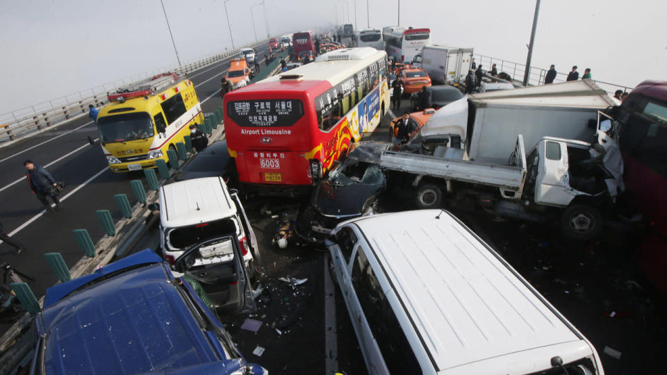 A pile-up involving about 100 vehicles has killed two people and injured at least 42 more in Seoul.