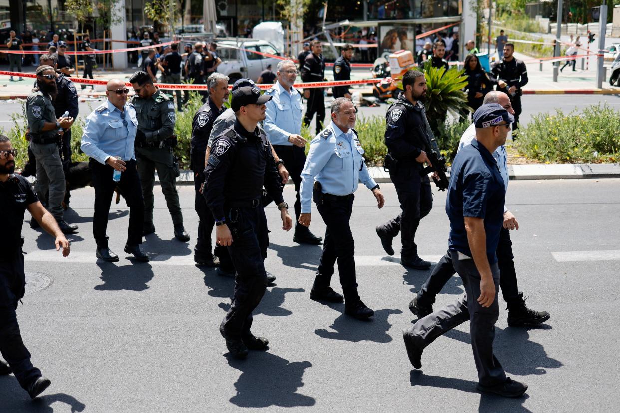 Israeli police walk at the scene of a ramming attack in Tel Aviv, (REUTERS)