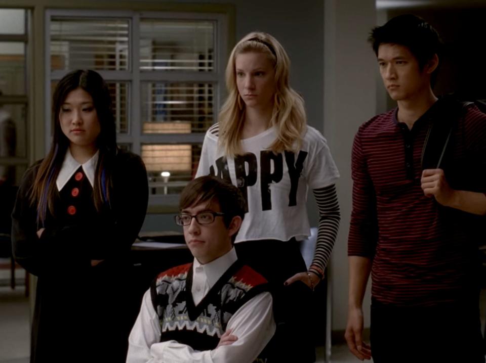 The Brainiacs (Mike, Tina, Artie, and Brittany) team on Glee.